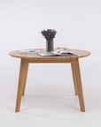Table de salle à manger ronde à rallonge en hêtre ou chêne massif SAGA : KARPIS