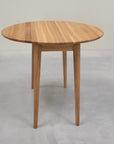Table de salle à manger ronde à rallonge en chêne massif LUNA | VESKOR